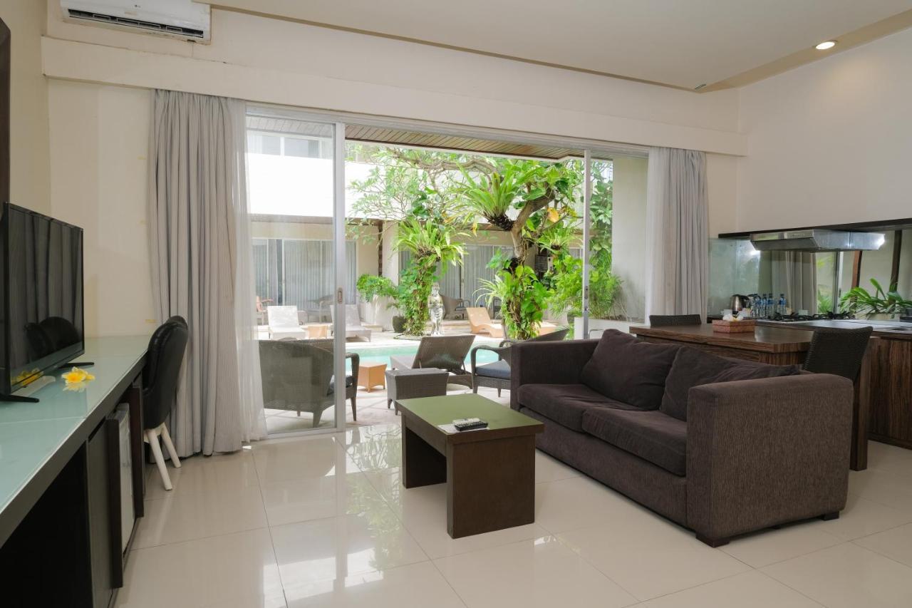 Aparthotel Swiss-Belcourt Sunset Seminyak Exterior foto