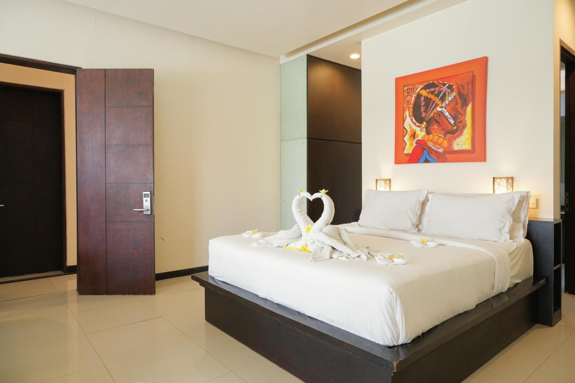Aparthotel Swiss-Belcourt Sunset Seminyak Exterior foto